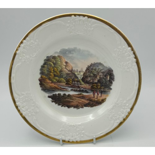 184 - A group of early 19th century hand-painted porcelain plates, of moulded form with titled Indian view... 