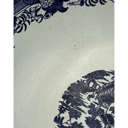 192 - A group of early 19th century blue and white transfer printed Conversation pattern bowls, c. 1800. 2... 