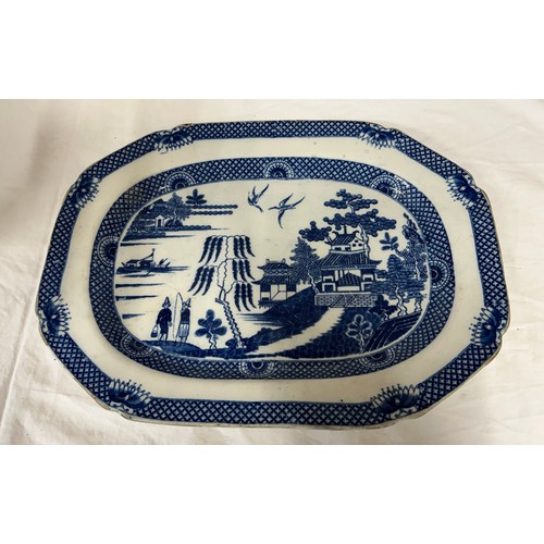 198 - A group of four early 19th century blue and white transfer printed platters, c. 1800. To include Two... 