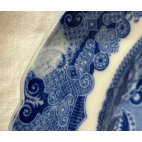 198 - A group of four early 19th century blue and white transfer printed platters, c. 1800. To include Two... 