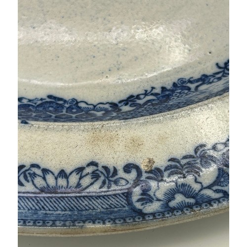 199 - A group of early 19th century blue and white transfer printed chargers and similar platter, c. 1800.... 