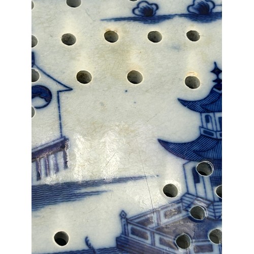 200 - A group of three early 19th century blue and white transfer printed drainers, c. 1800. To include Wi... 