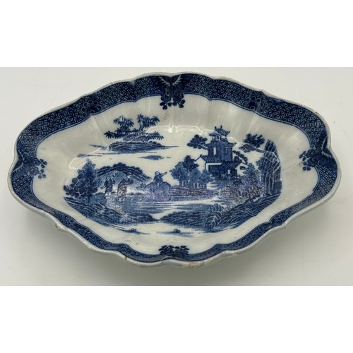 201 - A group of early 19th century blue and white transfer printed Boy on a Buffalo wares, c. 1800. To in... 