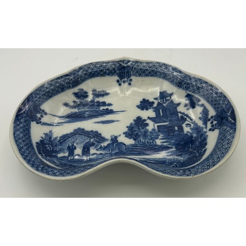 201 - A group of early 19th century blue and white transfer printed Boy on a Buffalo wares, c. 1800. To in... 