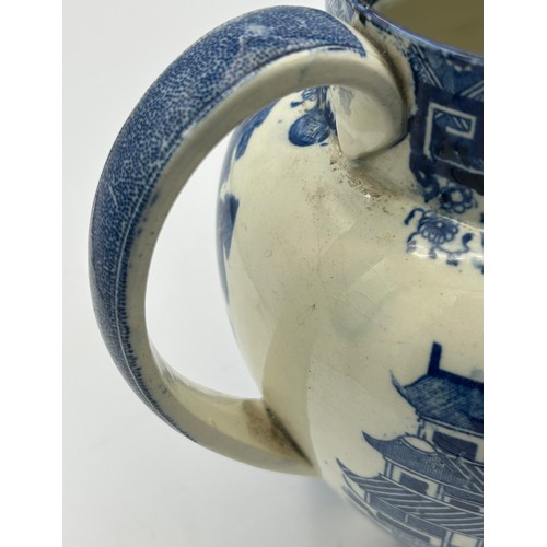 206 - Three early 19th century blue and white transfer printed wares, c. 1800. Including a Spode Boy on a ... 