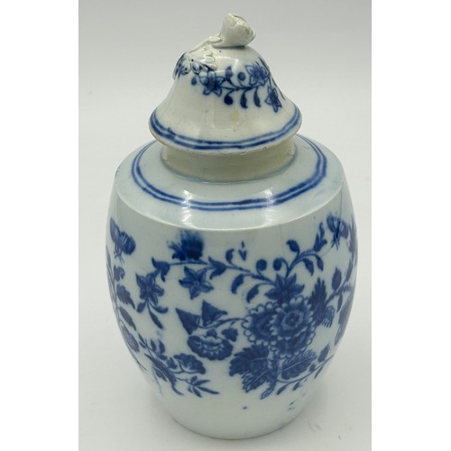 208 - An early 19th century blue and white transfer printed floral pattern tea caddy and cover, c. 1800. 1... 