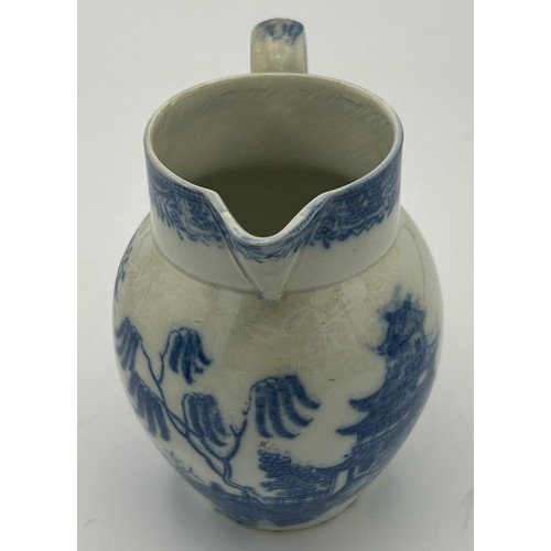 211 - A group of early 19th century blue and white transfer printed jugs, c. 1800-10. Tallest: 12 cm. (5)
... 