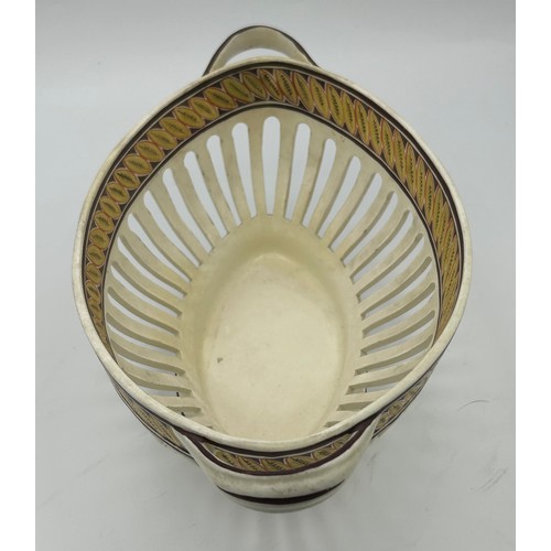 213 - A group of early 19th century creamware pieces, c. 1810. To include a chestnut basket, a sauce turee... 