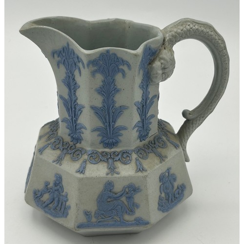 229 - A group of three early 19th century Spode jugs, c. 1825. To include a drabware, bat printed jug, a s... 