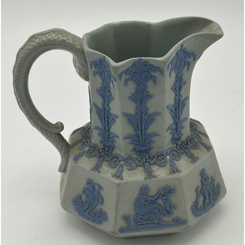 229 - A group of three early 19th century Spode jugs, c. 1825. To include a drabware, bat printed jug, a s... 