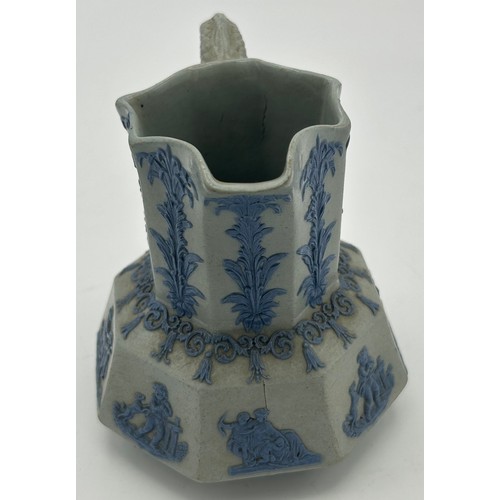 229 - A group of three early 19th century Spode jugs, c. 1825. To include a drabware, bat printed jug, a s... 