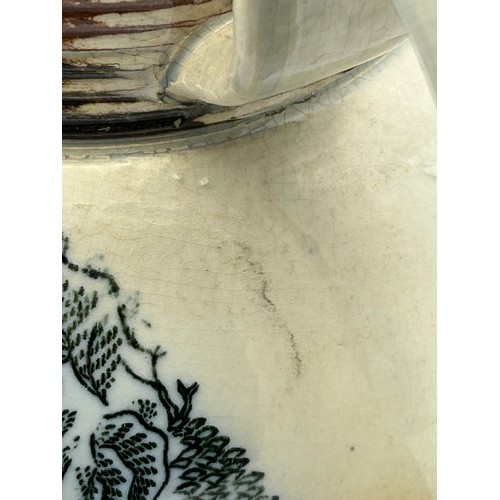 231 - An early 19th century black and white transfer printed jug, c. 1800. Together with a lidded Marble p... 