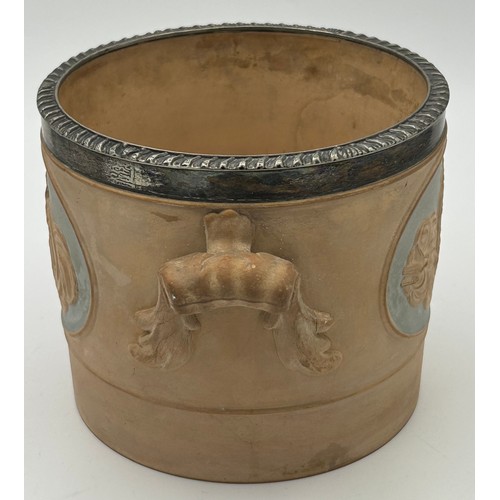 232 - An early 19th century Spode terracotta body two-handed bottle coaster, c. 1810. It is decorated with... 