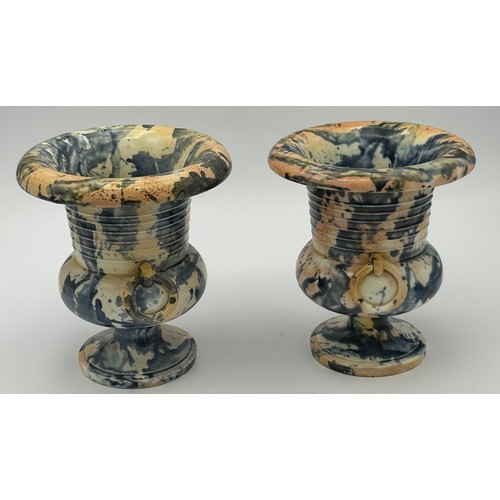 238 - A pair of early 19th century pearlware two-handled urns of campagna shape, c. 1820. Each with mottle... 