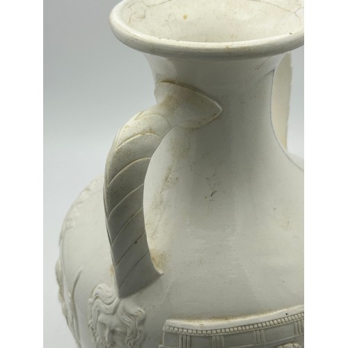 244 - A 19th century Wedgwood white stone ware body Portland Vase, c. 1850. 25 cm tall. (1)

Condition: ch... 