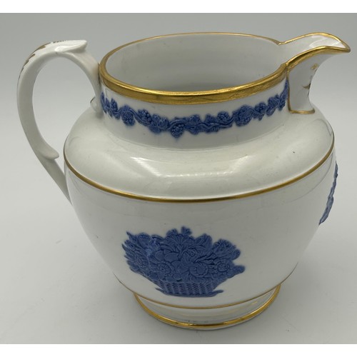 250 - An early 19th century porcelain, sprig moulded jug, possibly Spode, c. 1820. 16 cm tall. (1)

Condit... 