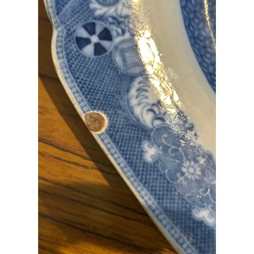 275 - An early 19th century blue and white transfer printed large Spode Willow platter, c. 1810. Together ... 