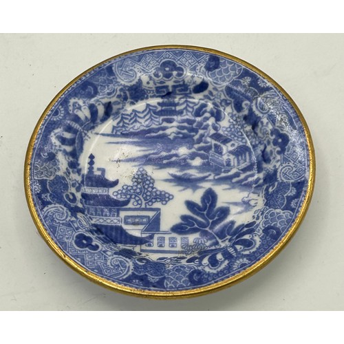 284 - A mixed lot of mainly 18th and19th century ceramics. To include: a tin glazed delft plate, a Chinese... 