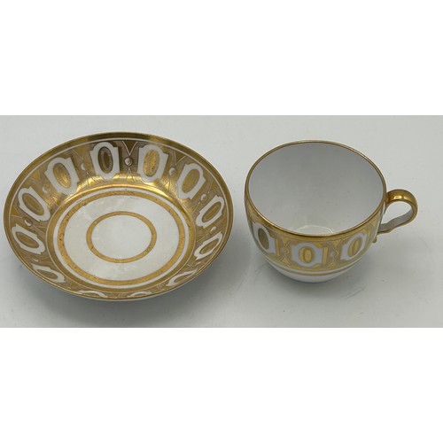 293 - A group of early 19th century hand-painted porcelain cups and saucers with gilding, c. 1820. Saucers... 