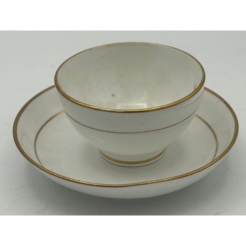 295 - A group of early 19th century hand-painted Spode porcelain cups and saucers with gilding, c. 1820. S... 