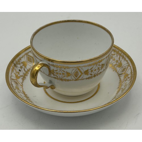 295 - A group of early 19th century hand-painted Spode porcelain cups and saucers with gilding, c. 1820. S... 