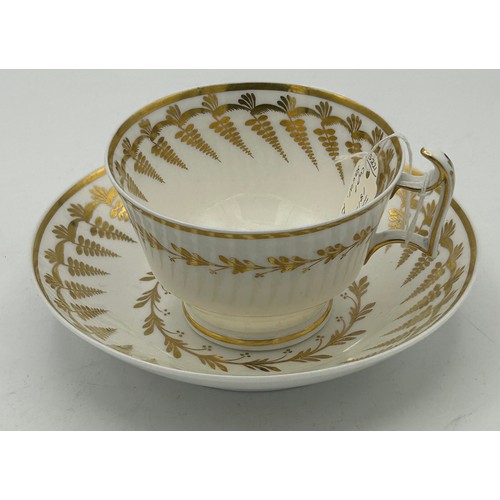 296 - A group of early 19th century hand-painted Spode porcelain cups and saucers with gilding, c. 1820. S... 