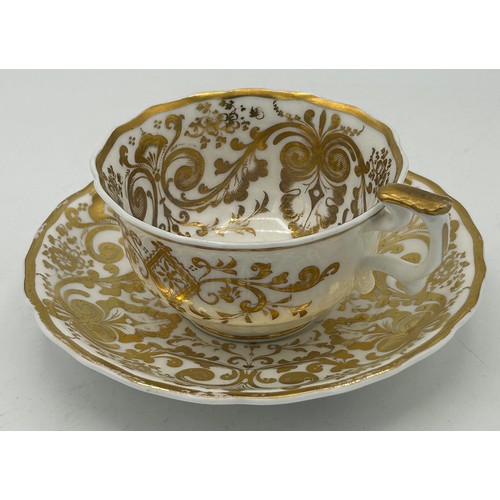 296 - A group of early 19th century hand-painted Spode porcelain cups and saucers with gilding, c. 1820. S... 