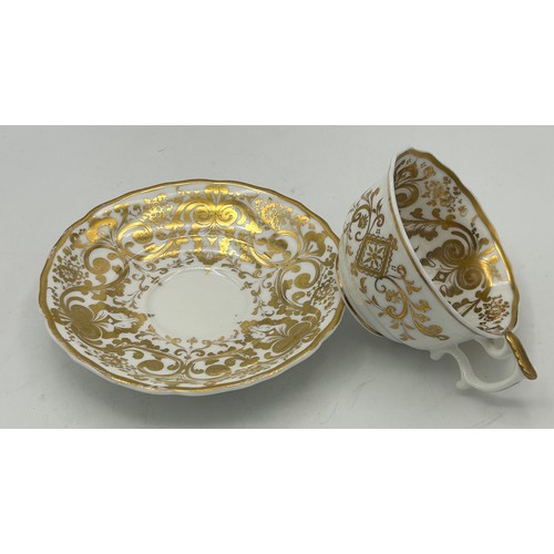 296 - A group of early 19th century hand-painted Spode porcelain cups and saucers with gilding, c. 1820. S... 