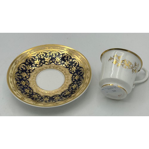 297 - A group of early 19th century hand-painted Spode porcelain cups and saucers with gilding and floral ... 