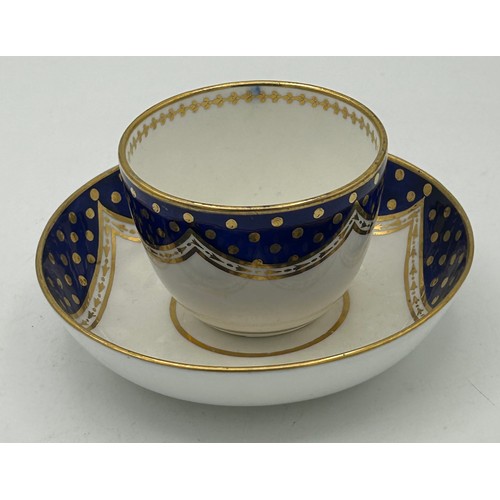 297 - A group of early 19th century hand-painted Spode porcelain cups and saucers with gilding and floral ... 