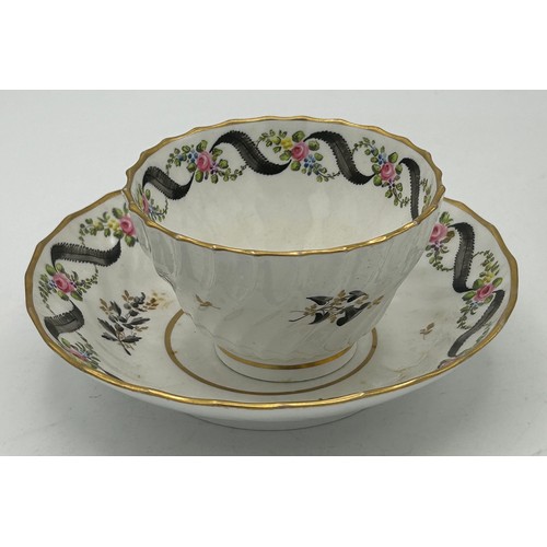 300 - A group of early 19th century hand-painted porcelain cups and saucers with gilding, and hand-painted... 