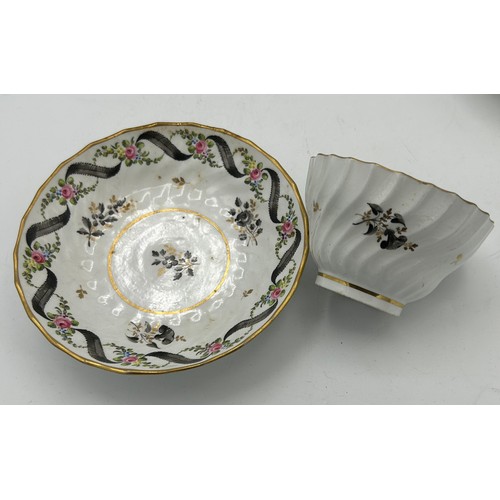 300 - A group of early 19th century hand-painted porcelain cups and saucers with gilding, and hand-painted... 