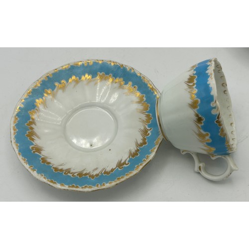 300 - A group of early 19th century hand-painted porcelain cups and saucers with gilding, and hand-painted... 