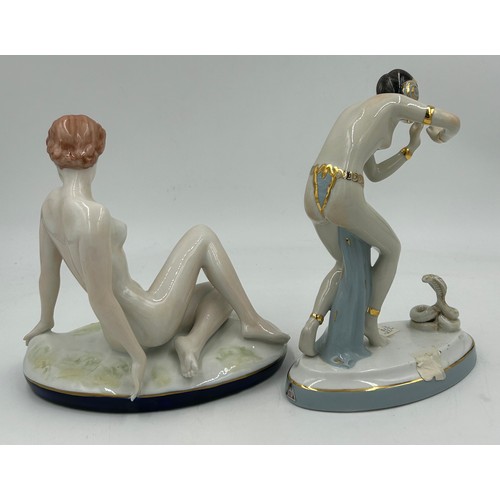 308 - Two Royal Dux Art Deco figures, a young woman seated on an oval naturalistic base with cobalt blue e... 