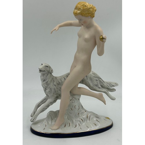 309 - Two Royal Dux figure groups, one depicting a female nude running with a Borzoi dog on oval base with... 