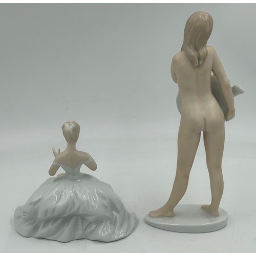 314 - Two Wallendorf female figurines. Nude lady with hat 27cm h impressed mark to base 1920 and a seated ... 