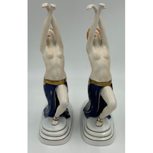 316 - A pair of Austrian Wien porcelain semi nude figurines depicting dancers in an Art Deco style with gi... 