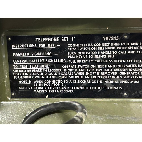 1010 - A pair of British Army Field Telephones Set J/ YA7815 in green metal cases, instructions for use pri... 