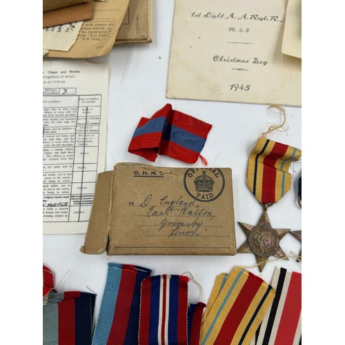 1015 - A collection of WW2 Medals and Ephemera to include 4 x 1939-45 Star, 4 x 1939-45 War Medal, 2 x Defe... 