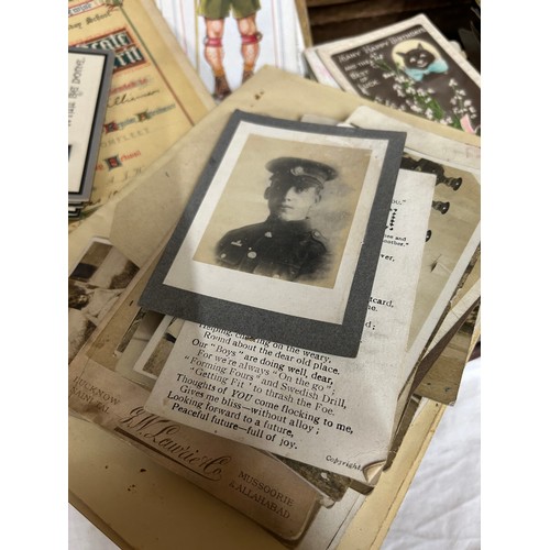 928 - A collection of Ephemera to include WW1 silk and embroidered postcards, war postcards and soldiers, ... 