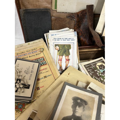 928 - A collection of Ephemera to include WW1 silk and embroidered postcards, war postcards and soldiers, ... 