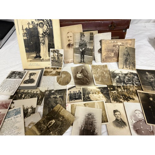 928 - A collection of Ephemera to include WW1 silk and embroidered postcards, war postcards and soldiers, ... 