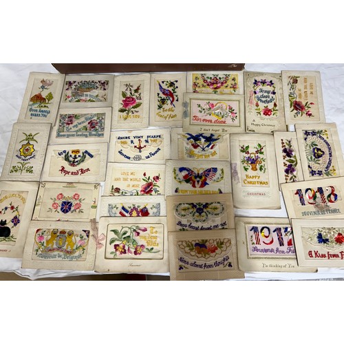 928 - A collection of Ephemera to include WW1 silk and embroidered postcards, war postcards and soldiers, ... 