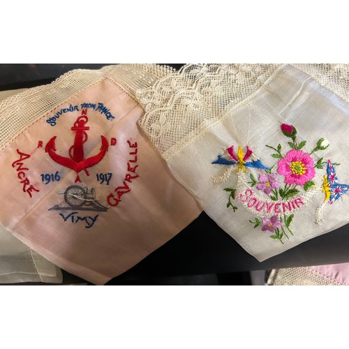 876 - A quantity of WW1 silk embroidered items to include 4 x padded bags/pouches, 6 x handkerchiefs souve... 