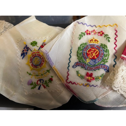 876 - A quantity of WW1 silk embroidered items to include 4 x padded bags/pouches, 6 x handkerchiefs souve... 