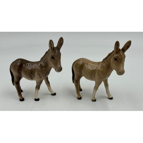 434 - A Collection of Beswick to include a fox, 2 x Donkey/Mules, 3 x bay horses and one palomino horse. T... 