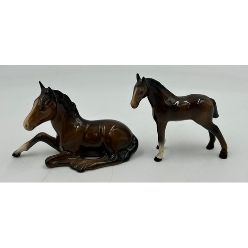 434 - A Collection of Beswick to include a fox, 2 x Donkey/Mules, 3 x bay horses and one palomino horse. T... 