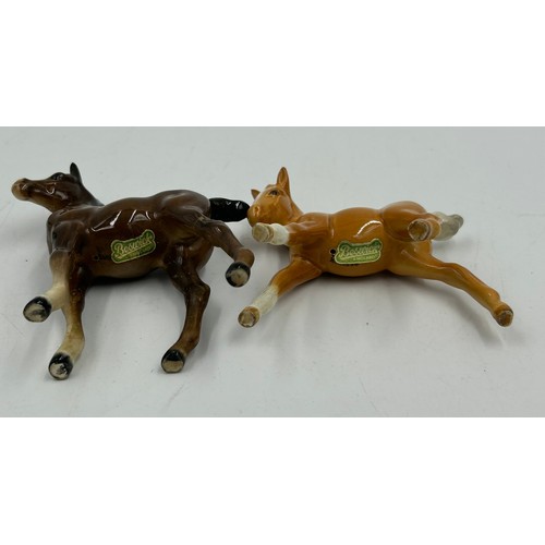 434 - A Collection of Beswick to include a fox, 2 x Donkey/Mules, 3 x bay horses and one palomino horse. T... 