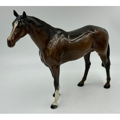 435 - Four Beswick Horses to include 2 x Bays with white blaze front socks 28cm & 20cm, Palomino with whit... 