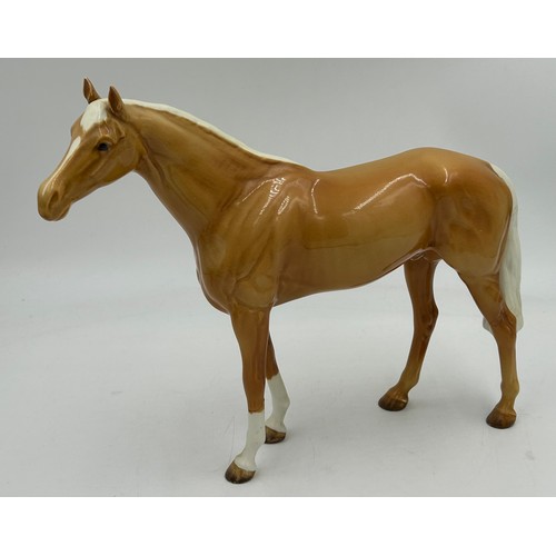 435 - Four Beswick Horses to include 2 x Bays with white blaze front socks 28cm & 20cm, Palomino with whit... 